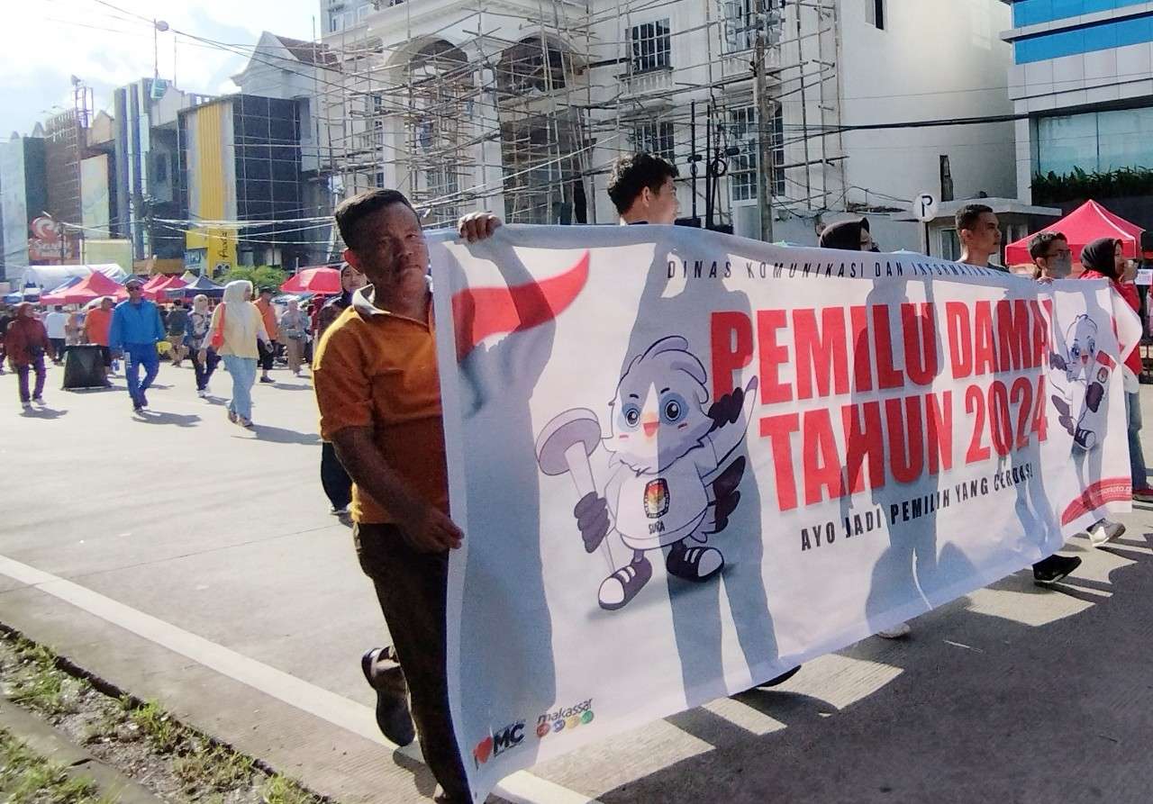 Diskominfo Kota Makassar Duet Jurnalis Sosialisasi Pemilu Damai 2024 di Area CFD Boulevard