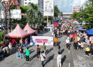 Diskominfo Kota Makassar Duet Jurnalis Sosialisasi Pemilu Damai 2024 di Area CFD Boulevard